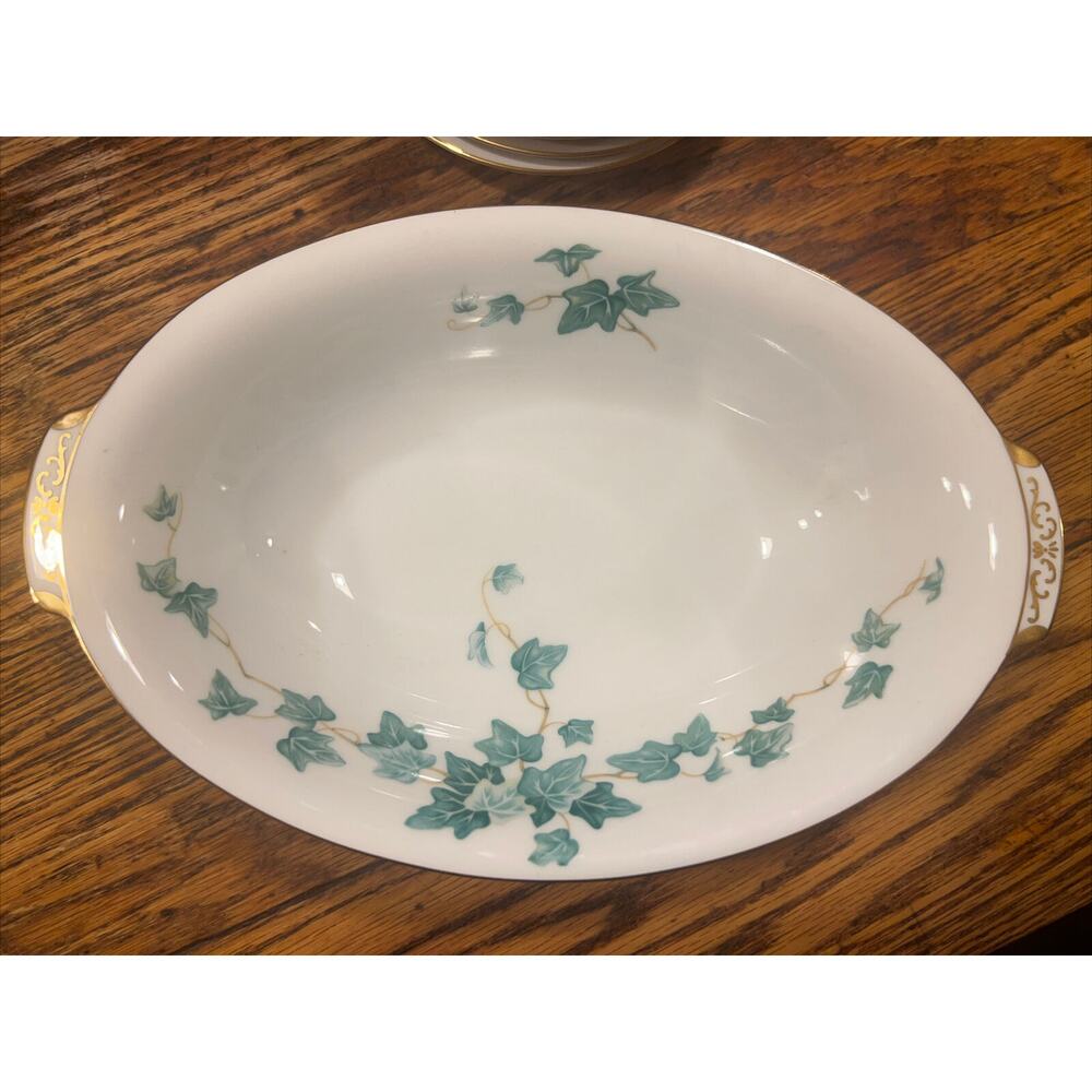 Sango Caprice serving oval bowl. With green ivy and gold trim. 10 1/2” EXCELLENT